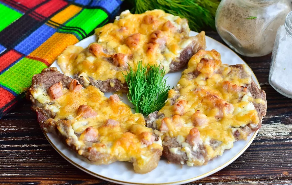 Pork with ham and cheese in the oven