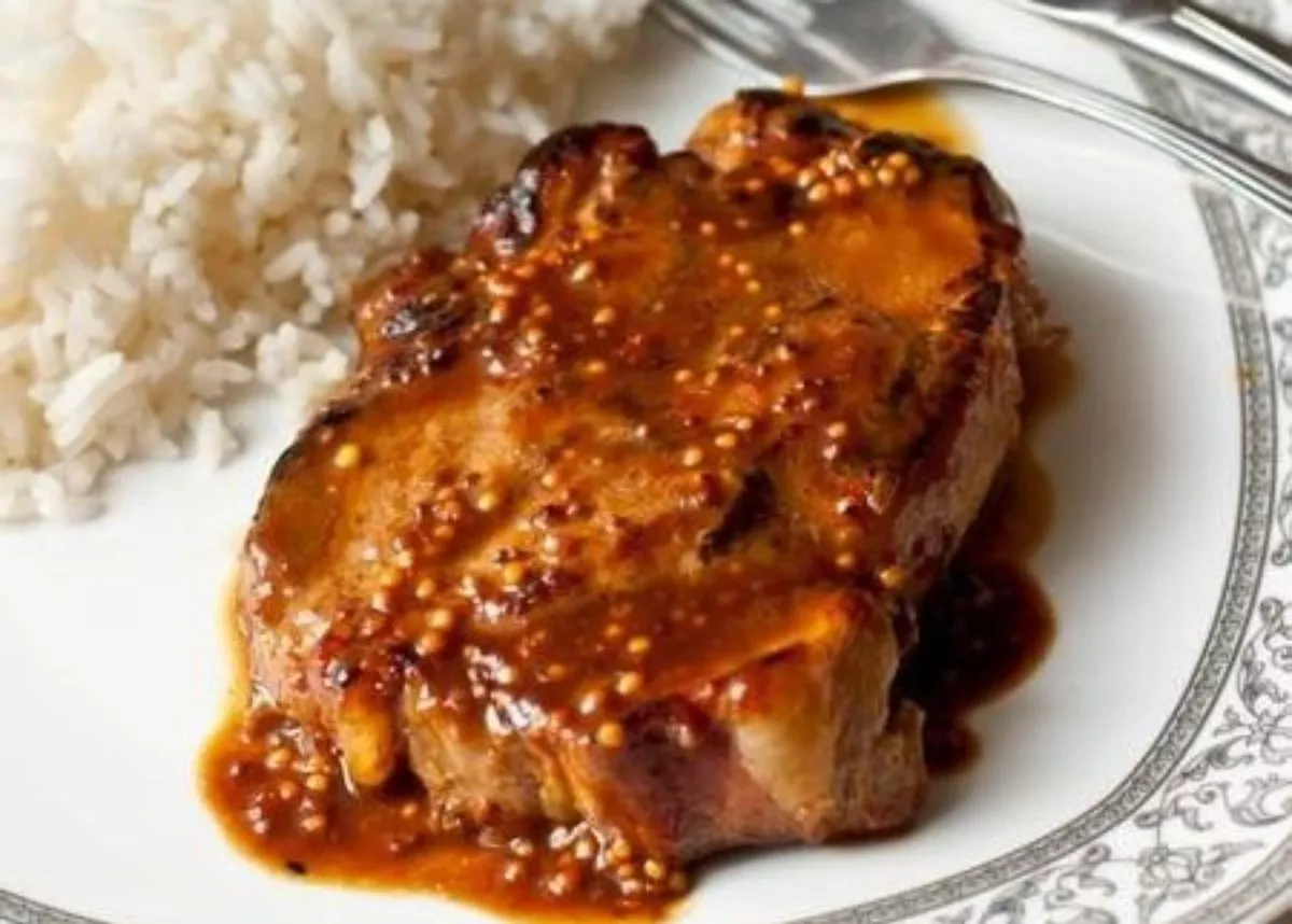 Pork steak with orange mustard sauce
