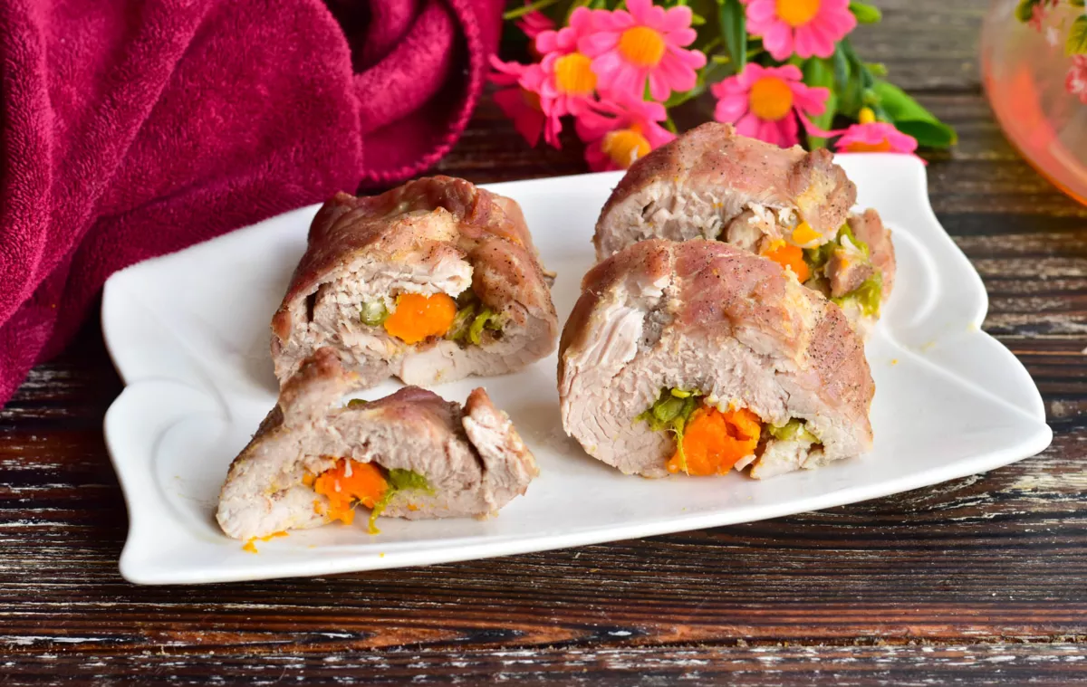 Pork roll with vegetables in the oven