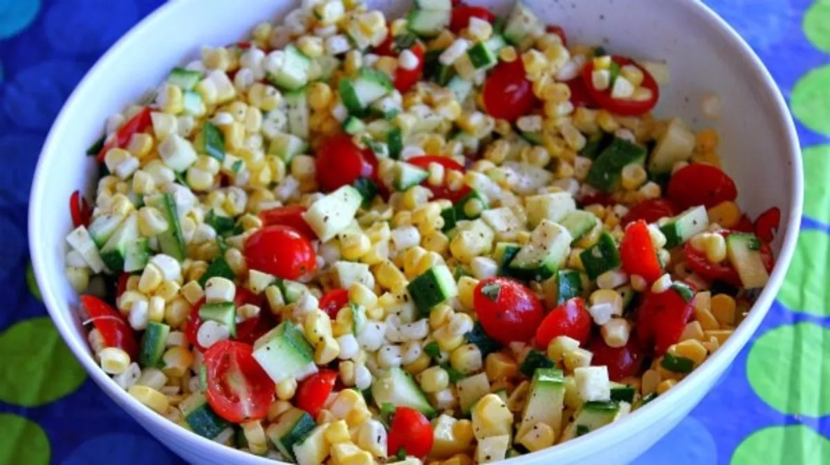 Salad of corn, zucchini and tomatoes