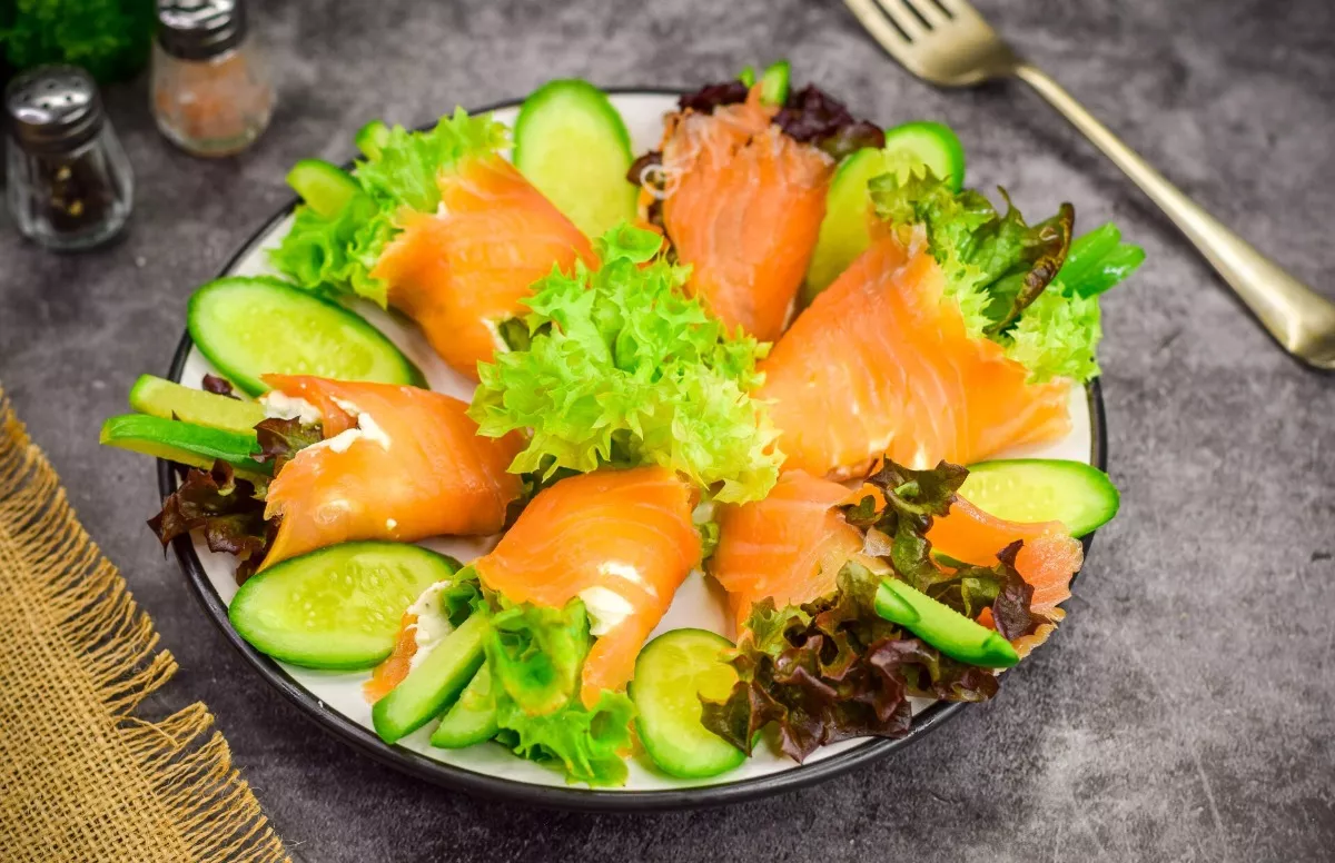 Salmon rolls with cottage cheese and cucumber filling