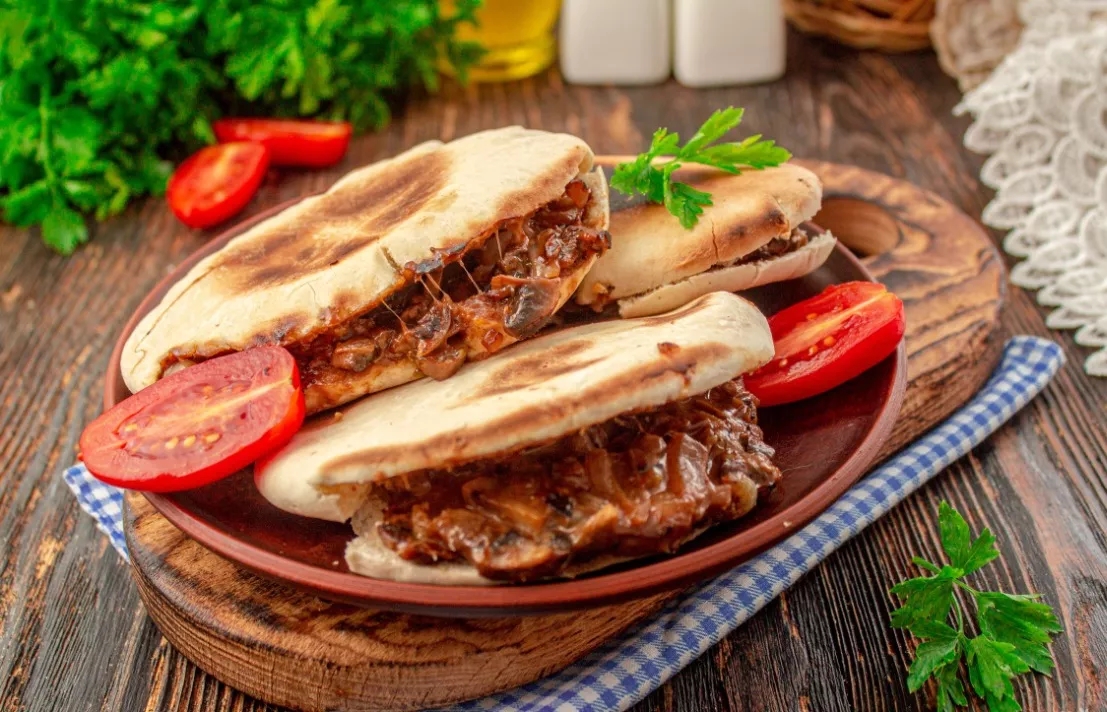 Pita with cheese and mushrooms