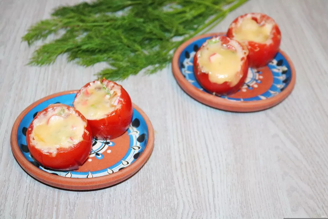 Tomatoes stuffed with crab sticks