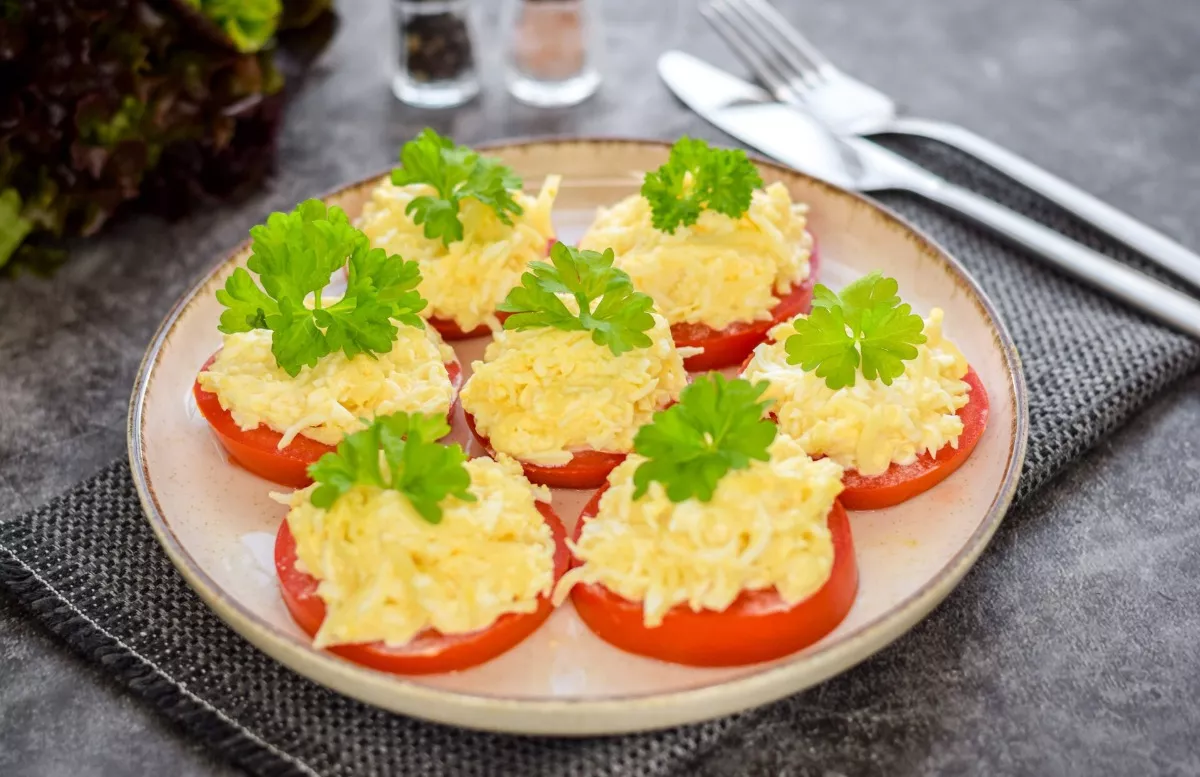 Tomatoes under the cheese cap