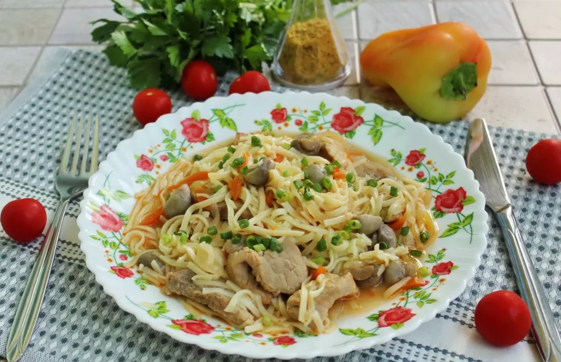 Sweet and sour pasta with pork and vegetables