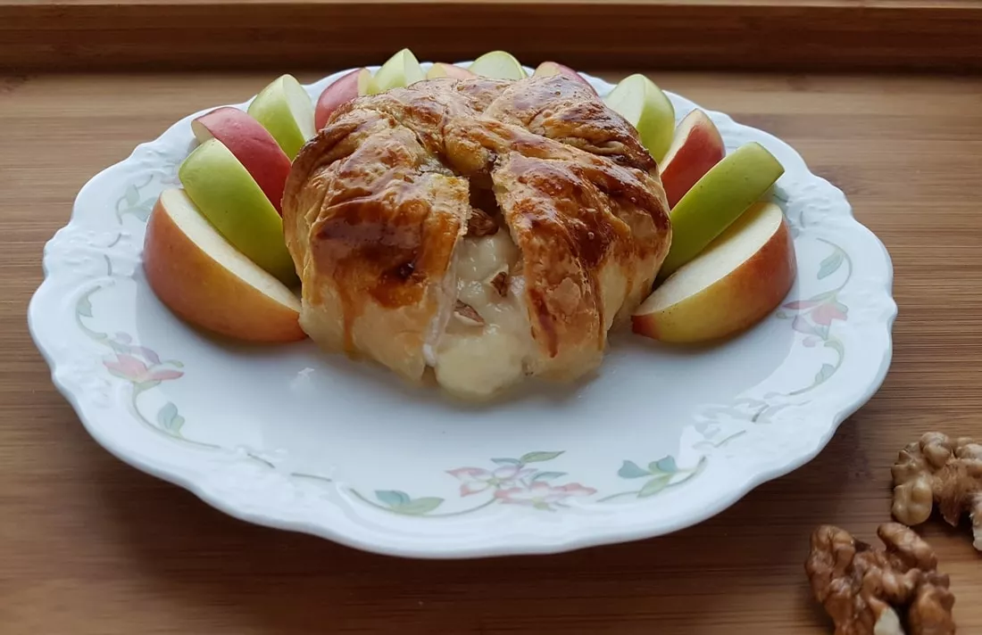 Cheese baked in the dough with apples