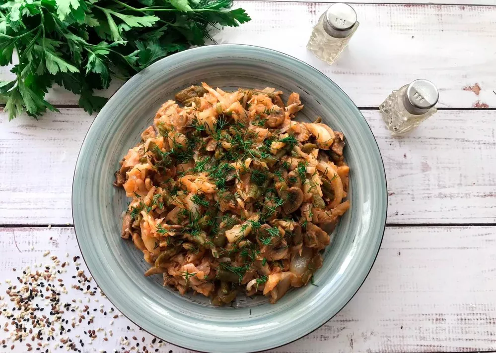 Stewed cabbage with mushrooms and beans