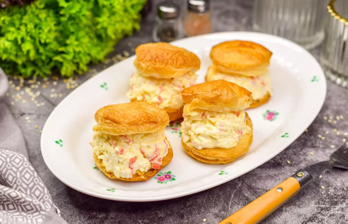 Appetizer from puff pastry with crab sticks