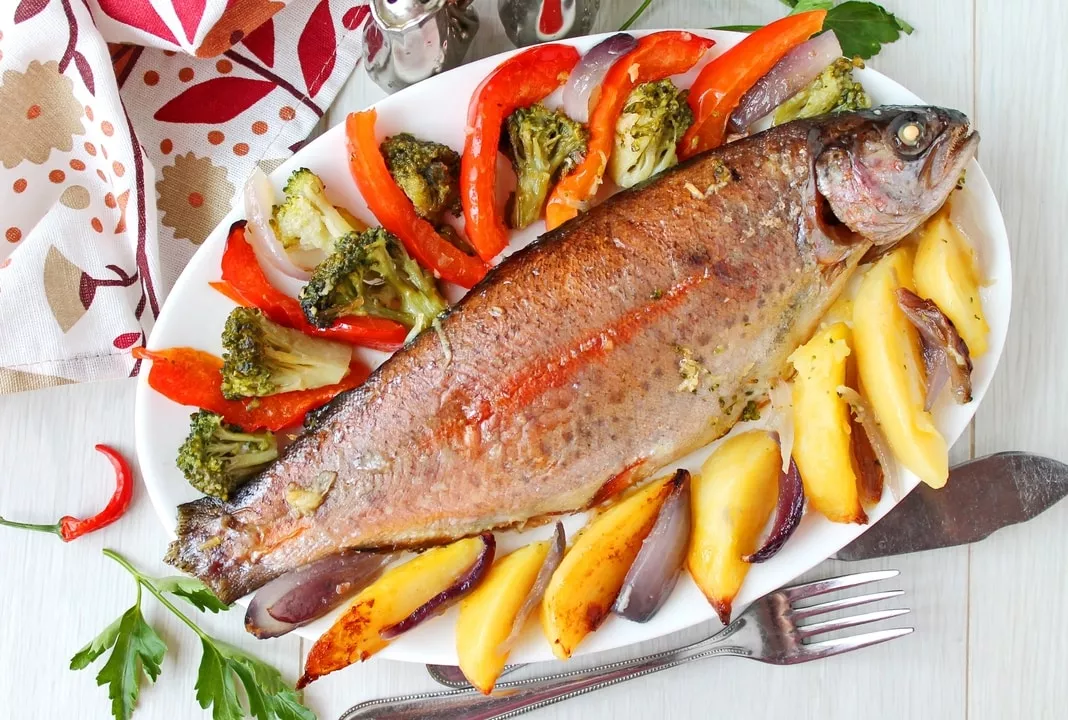 Rainbow trout in the oven with vegetables