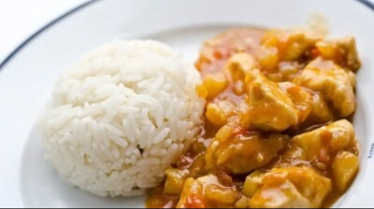 Chicken with pineapple in a pan