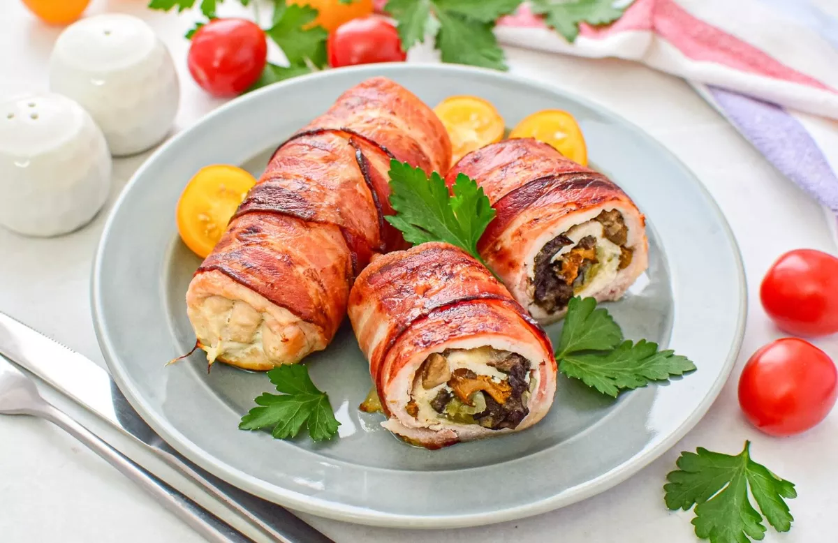 Chicken rolls on the side with mushrooms