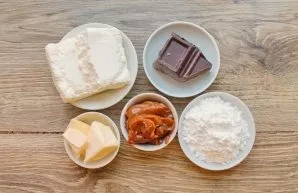 Prepare all the necessary ingredients for making glazed cottage cheese with condensed milk.