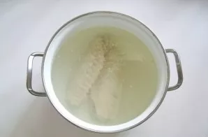 Bring the turkey broth to a boil. I use wings, but you can use any part.