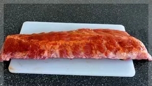 Wash the ribs, dry with a towel. Rub with pepper, salt.