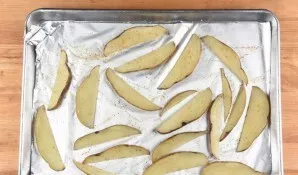Cut the potatoes into slices. Then bake them in the oven at 230 degrees for 20 minutes, adding butter, salt and pepper.
