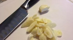 Peel the garlic and cut into thin slices with a sharp knife. If you like spicy dishes, you can increase the amount of garlic at your disc...