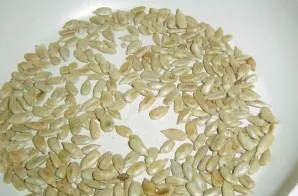 I buy sunflowers already shelled and unsalted. If they are not there, you can pre-clean them yourself. I put the pan over medium heat, af...