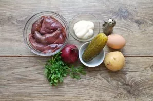 Prepare all the necessary ingredients for making salads. Clean the liver, cook over medium heat for 30-40 minutes until cooked, cool. Boi...