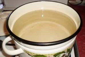 We put water on the fire, prepare berries and fruits. For compote, it can be any berries to taste. In this case, we took black currants a...