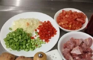 Prepare the ingredients. Wash the rabbit meat thoroughly and cut it into small pieces. Cut the onion, bell pepper and tomatoes into small...