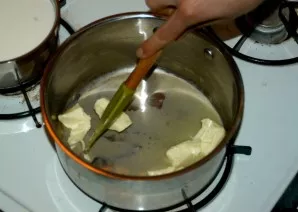 Melt the butter in a small saucepan, not allowing it to burn.
