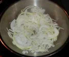 First, cut the onion into rings or half rings.