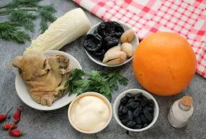 Prepare all the necessary ingredients. Rinse the grapefruit well with hot water with a soft brush and dry. Soak prunes and raisins in hot...