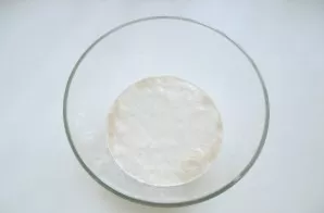 Pour warm milk into a bowl. Put the yeast, add 1 tablespoon of sugar to it, mix. Let stand for 10-15 minutes. After this time, the yeast ...