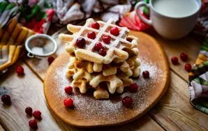 Serve waffles with your favorite syrup and berries.