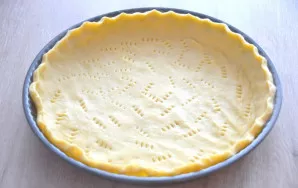 Roll the dough into a layer, transfer it to the mold, form the sides, prick the bottom with a fork, put it in the freezer for about 15 mi...