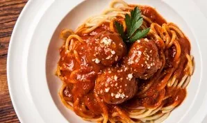 Serve the prepared dumplings with sauce and garnish to taste. Enjoy your meal!