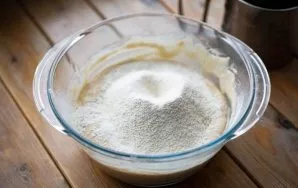 Then sift the flour in parts and knead first with a spoon, and then with your hands. Control the amount of flour yourself, in the end you...