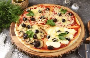 Serve the prepared pizza hot. Delicious!