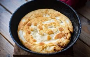 Heat 1-2 tablespoons of vegetable oil in a pan and put the cake, fry on both sides until golden brown. Also prepare the second half of th...