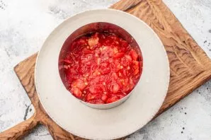 Put chopped tomatoes on top.