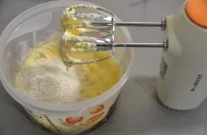 Continuing to beat, gradually add the flour mixture.