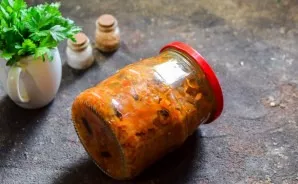 Roll up the jar with a lid and turn it upside down, cover with a blanket and leave for a day. Then transfer the workpiece to the pantry.