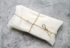 Wrap the cake in baking paper and store in the refrigerator for at least two weeks. After that, sprinkle with powdered sugar and decorate...