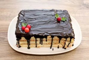 Pour the icing on top of the cake and let it set. Then decorate the cake and serve.