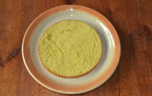 Carefully cut in half into two layers.