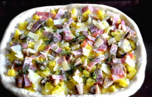 Pour bacon on top, sprinkle with chopped parmesan, sprinkle with olive oil.