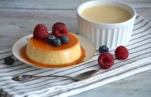 Before serving, carefully swipe the knife along the sides of the mold, cover with a serving plate and turn it over. Garnish with fresh be...
