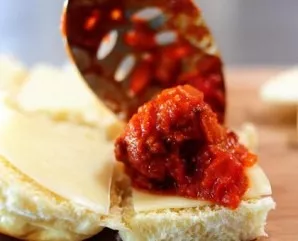 Put the meatball on the bun.