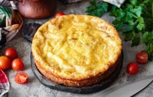 Remove the casserole from the mold, cool slightly, cut into portions and serve.