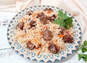 Our Basmati rice pilaf is ready. Arrange portions and serve. Delicious!