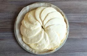 After the time has elapsed, grease the future bread with an egg. Put to bake in an oven preheated to 200 degrees for 20 minutes.