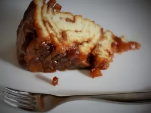 Carefully cut into portions and you can serve on the table.