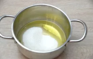 While the base of the cake is baking, in the 