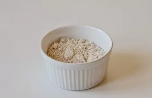 Grind oatmeal with a blender or coffee grinder.
