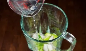 Put everything in a blender bowl and add water.
